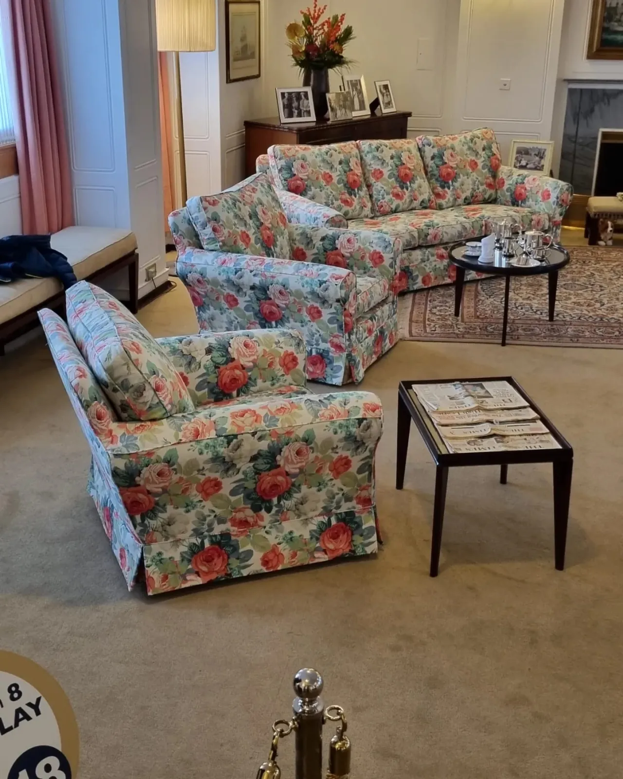 Floral rose-print sofa and armchair reupholstered in the state sitting room of the Royal Yacht Britannia