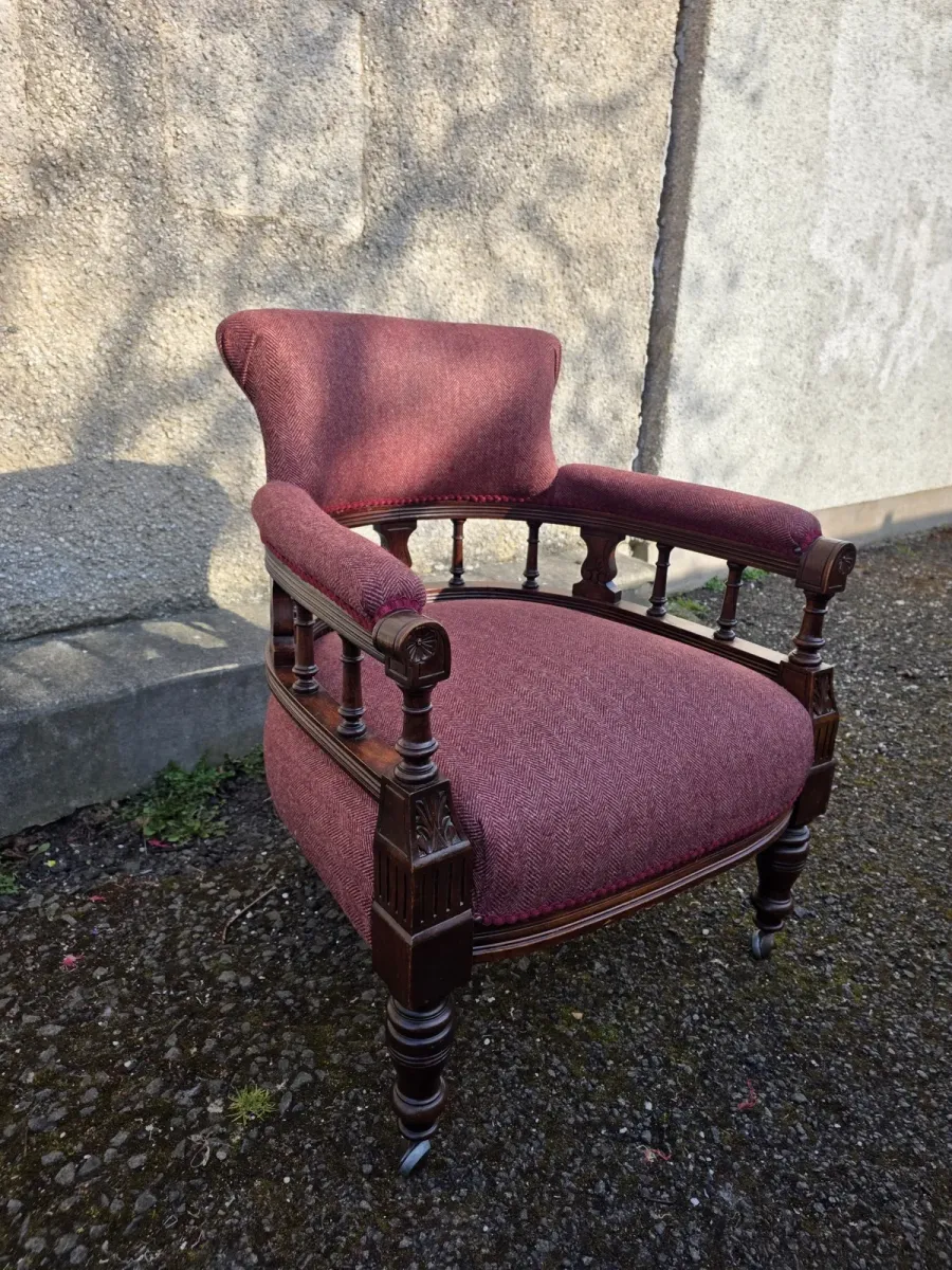 Antique tub chair reupholstered in burgundy herringbone wool