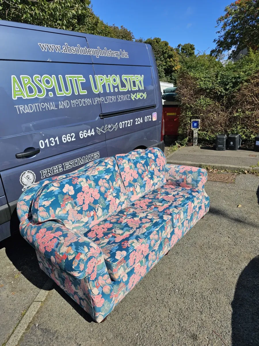Sofa reupholstered in a blue and pink oriental chinoiserie print