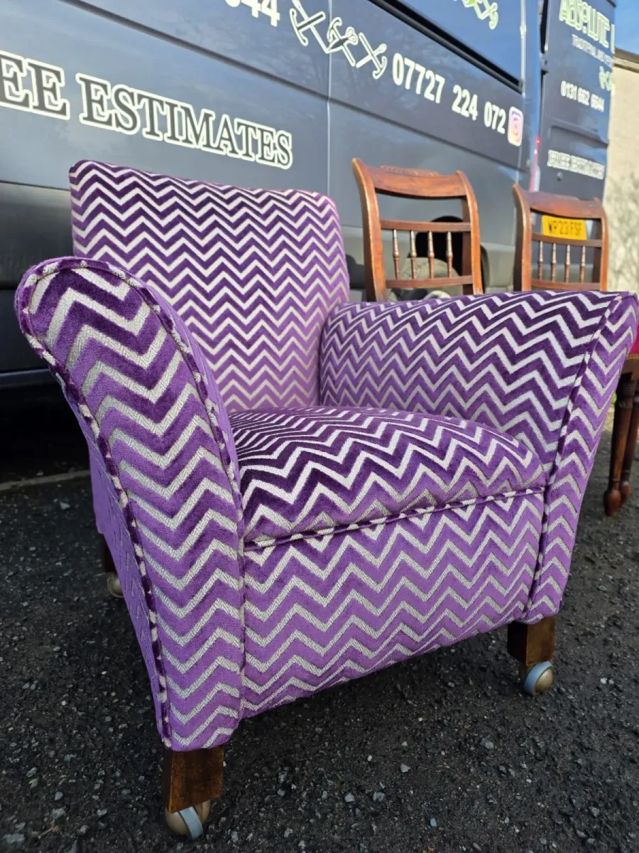 Art deco armchair reupholstered in a purple and silver chevron velvet